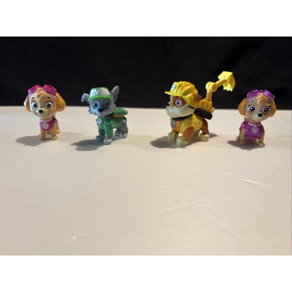 Lot of 4 Paw Patrol Dog Figurines Skye Rocky Rubble Action Figures